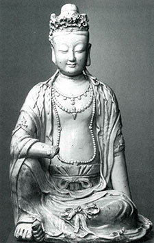 A large Ying-chi'ing glazed porcelain figure of a seated Kwan Yin. From Jingdeshen, China, Yuan Dynasty, dated 1298 or 1299. Courtesy the Nelson-Atkins Museum of Art, Kansas City, Missouri (Purchase: Nelson Trust).