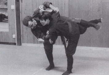Rumiko Hayes performing ninja technique, shifting her opponent off balance (left) and taking him down with a kick (right), Kasumi-an Dojo, Germantown, Ohio, 1994. (Courtesy Rumiko Hayes)
