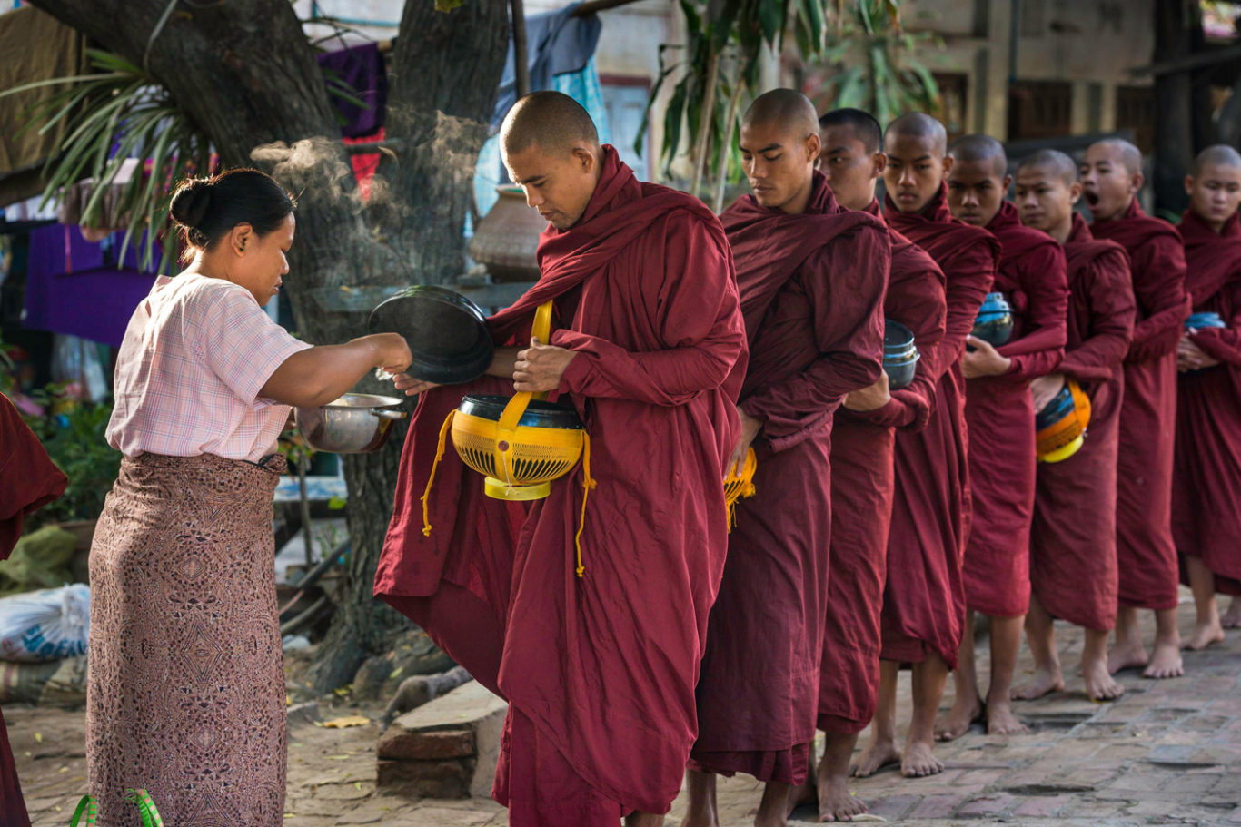 burmese buddhist monks on alms round