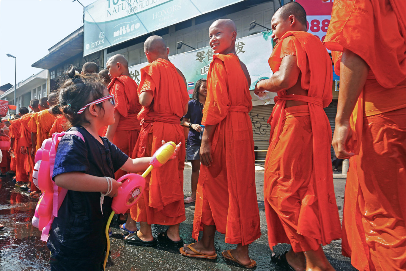 photo of monks at Songkran water fight for buddhist new year