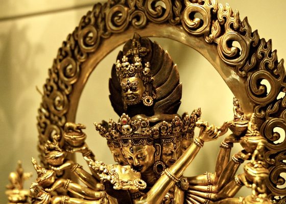 Metal Tibetan deity statue for article wondering if deities are real or pretend