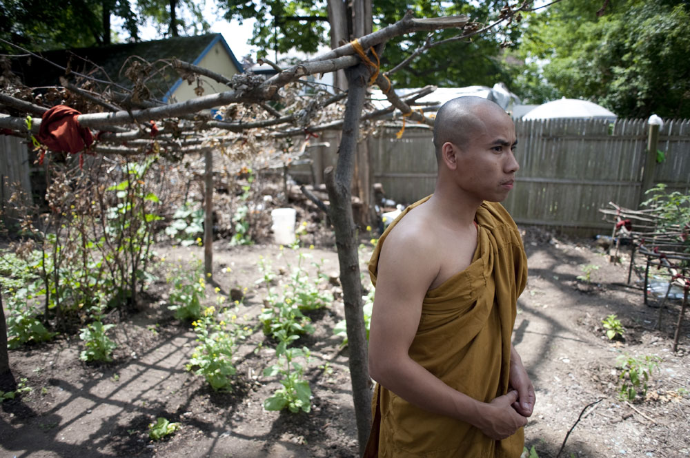 A Burmese monk tends his garden in Utica, New York.