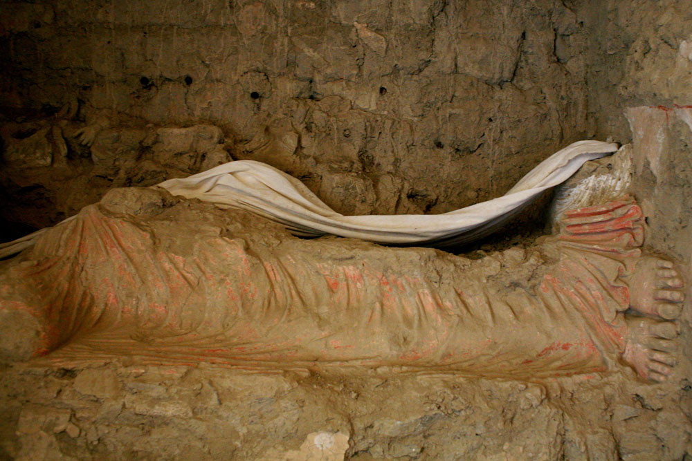 3-meter-long reclining Buddha, with a missing head, found in the southern chapel.