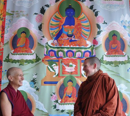 Image of Ven Thubten Chodron and Ven. Ayya Tathaaloka sitting together spiritual friendship
