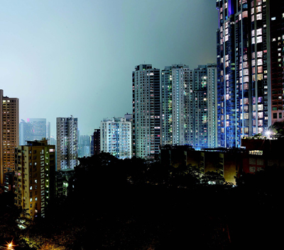 City skyline at night; green meditation
