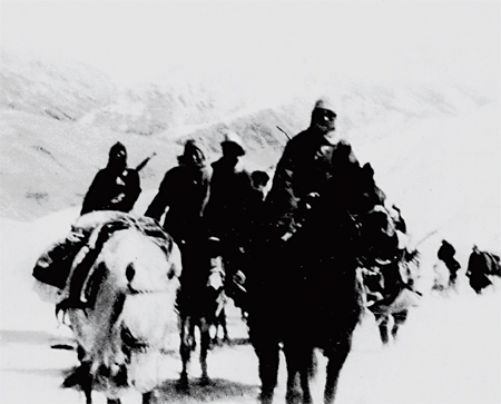 On March 28, 1959, three days before reaching sanctuary in northern India, the Dalai Lama's escape party crosses Karpo Pass on horseback.
