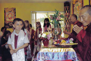 Palm Beach Dharma Center's children's class meets the Rinpoches. Courtesy of Palm Beach Dharma Center