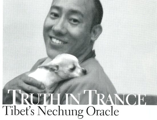 The Nechung Oracle, Thubten Ngodrup, poses with a small companion. Copyright Hannelore Evans.