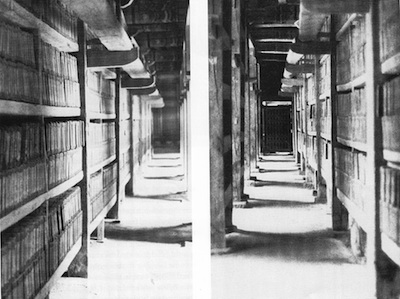Two views of the Tripitaka printing blocks stacked in their storage shelves. Courtesy of Robert Young.