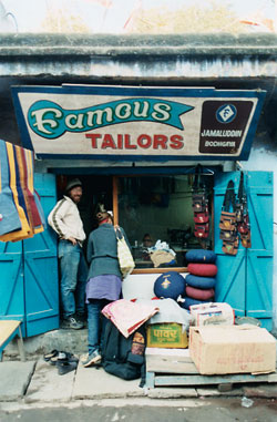 The author (right) visits Jamal Kalu's Famous Tailors shop, which serves pilgrims from all over the world. © Ric Schwabe