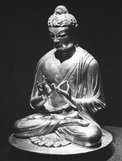 Shakyamuni Buddha, Chinese, eighth century, gilt bronze. Laima Druskis, Art Resource, NY.