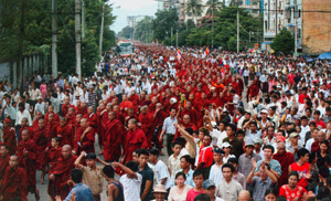 Uprising On September 24, 2007 more than 100,000 people, led by robed Buddhist monks, flooded the streets of Rangoon, Burma to march in protest against the nation's ruling junta © AFP/AFP/Getty Images