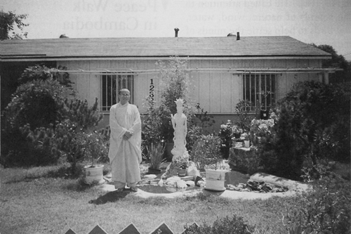  Venerable Thich Nguyen Tri in his front yard with a statue of the Buddha that the city of Garden Grove has asked him to remove.