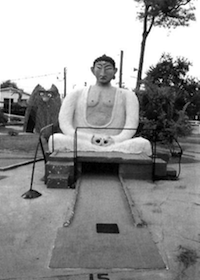 Putt-putt Buddha, Biloxi, Mississippi. Photograph by Jim Crump. 
