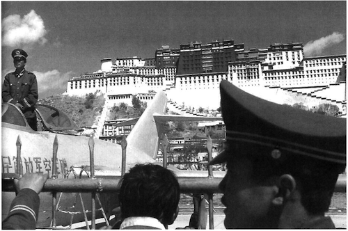 Image 1: Chinese People's Armed Police photograph themselves in front of The Potala Palace, in Lhasa, Tibet. Courtesy Steve Lehman.