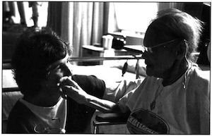 Image 5: Martha DeBarros, volunteer coordinator for the Zen Hospice Project in San Francisco, with Syd, a hospice patient. Courtesy A. Raja Hornstein