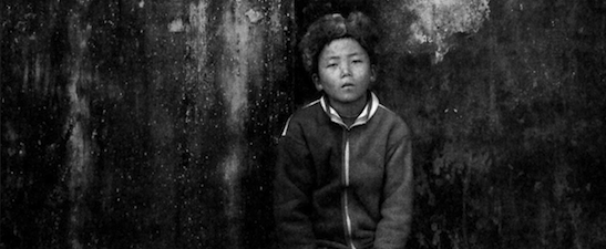 The Boy with the Fur Cap" "I do not know ayone here and I miss my parents. I am remembering them from thousands of miles and I cry now when thoughts of my parents come into my heart." Courtesy Talisman Press.