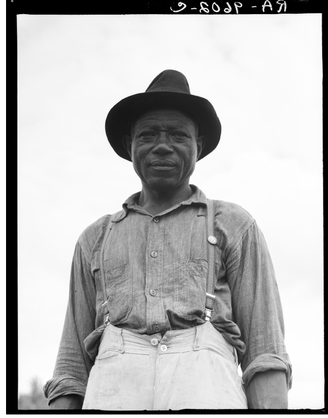 A sharecropper in Hill House, Mississippi. He wears the button of the Southern Tenant Famers Union, which fought for better working conditions during the Great Depression.