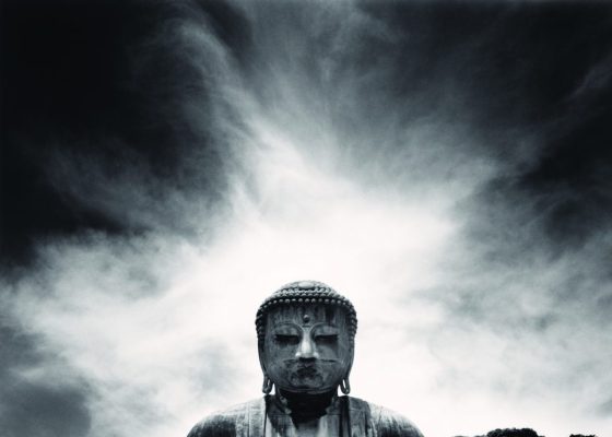 black and white image of large buddha statue, mindfulness