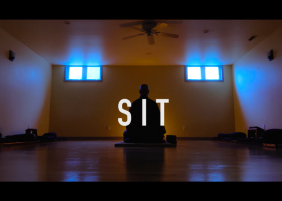 Still from SIT, a documentary by Yoko Okumura, showing a Zen priest meditating