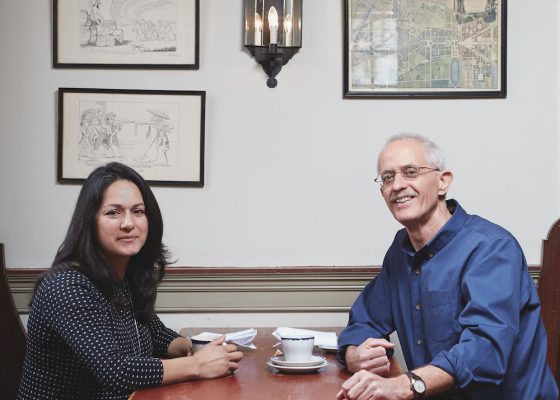 Muslim activist and a Buddhist priest sit together at a table, buddhism and islam