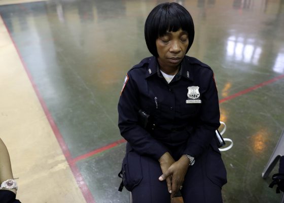 A correction officer meditates during Chaplain Justin von Bujdoss' weekly meditation class at Rikers Island.