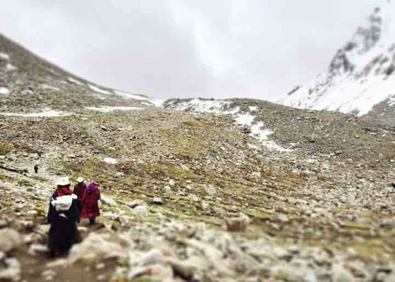 Pilgrims circumambulate Mount Kailash