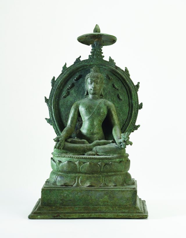 Medicine Buddha Bhaishajyaguru statue from central Java, Indonesia; 8th-9th century, high tin bronze (Encountering the Buddha: Art and Practice across Asia)