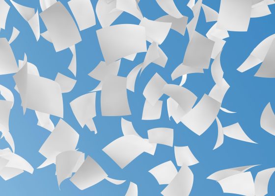 Papers flying in the blue sky, letters from max
