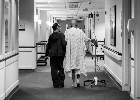 photograph of person in hospital gown, good enough death