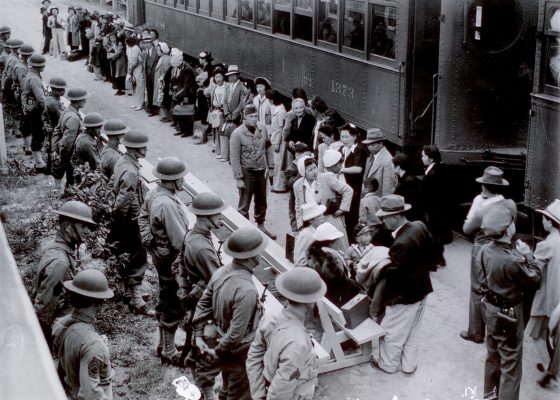 Detained Japanese Americans arrive at an assembly center in Santa Anita, California.