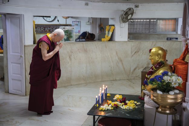 venerable karma lekshe tsomo bowing to statue of b.r. ambedkar at chaityabhumi stupa