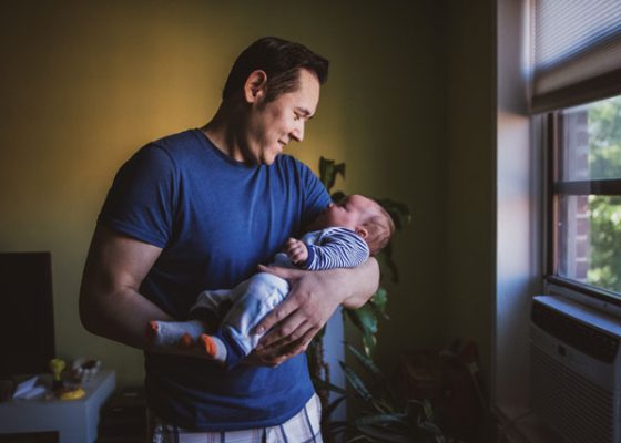 photo of Qalvy Grainzvolt with his infant son