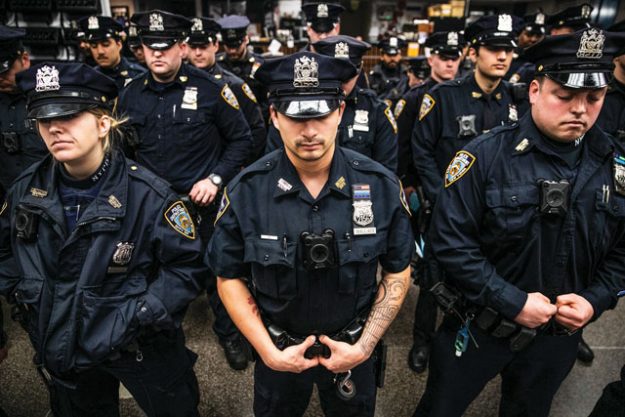 NYPD officers meditating while standing