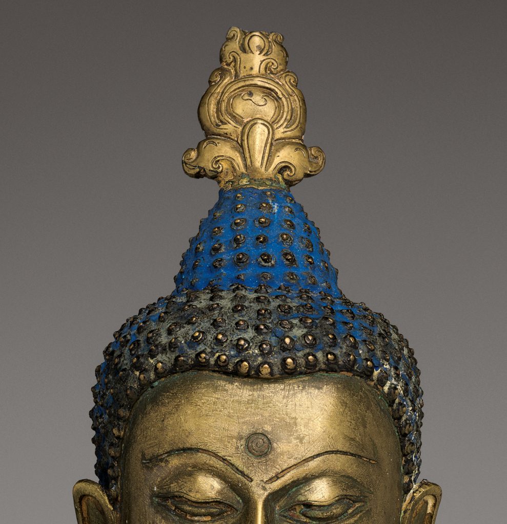 What’s That on Top of the Buddha’s Head?