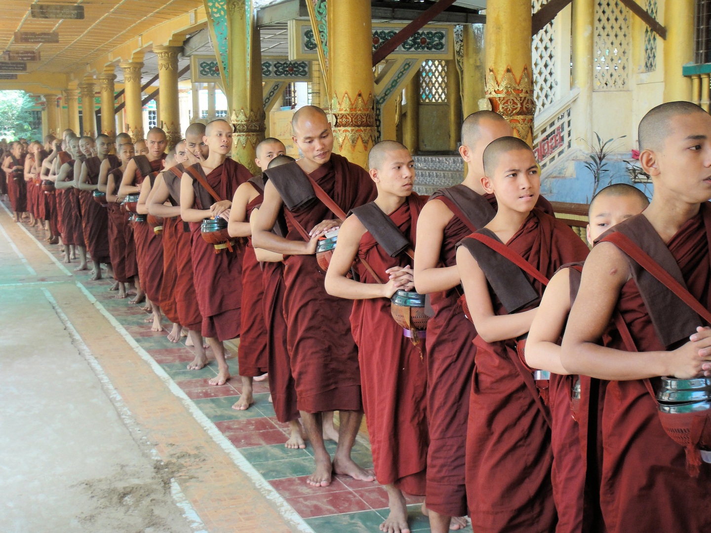 Busy lunch at a monastery in Myanmar. buddhism sangha
