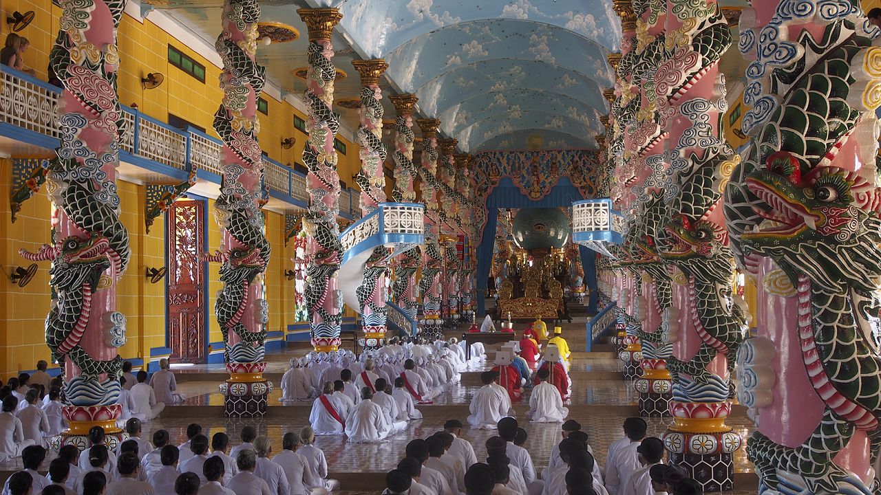 Cao Dai members in temple, modern buddhism