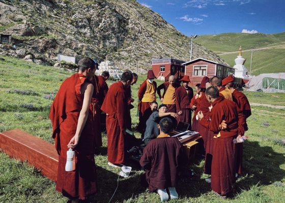 Howie Lee and monks at the Drolma Wesel-Ling Monastery